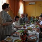 Participants at the evening mealtable in the Hotel Balti
